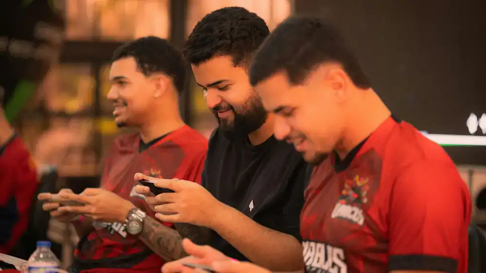Developers working on a mobile strategy game interface